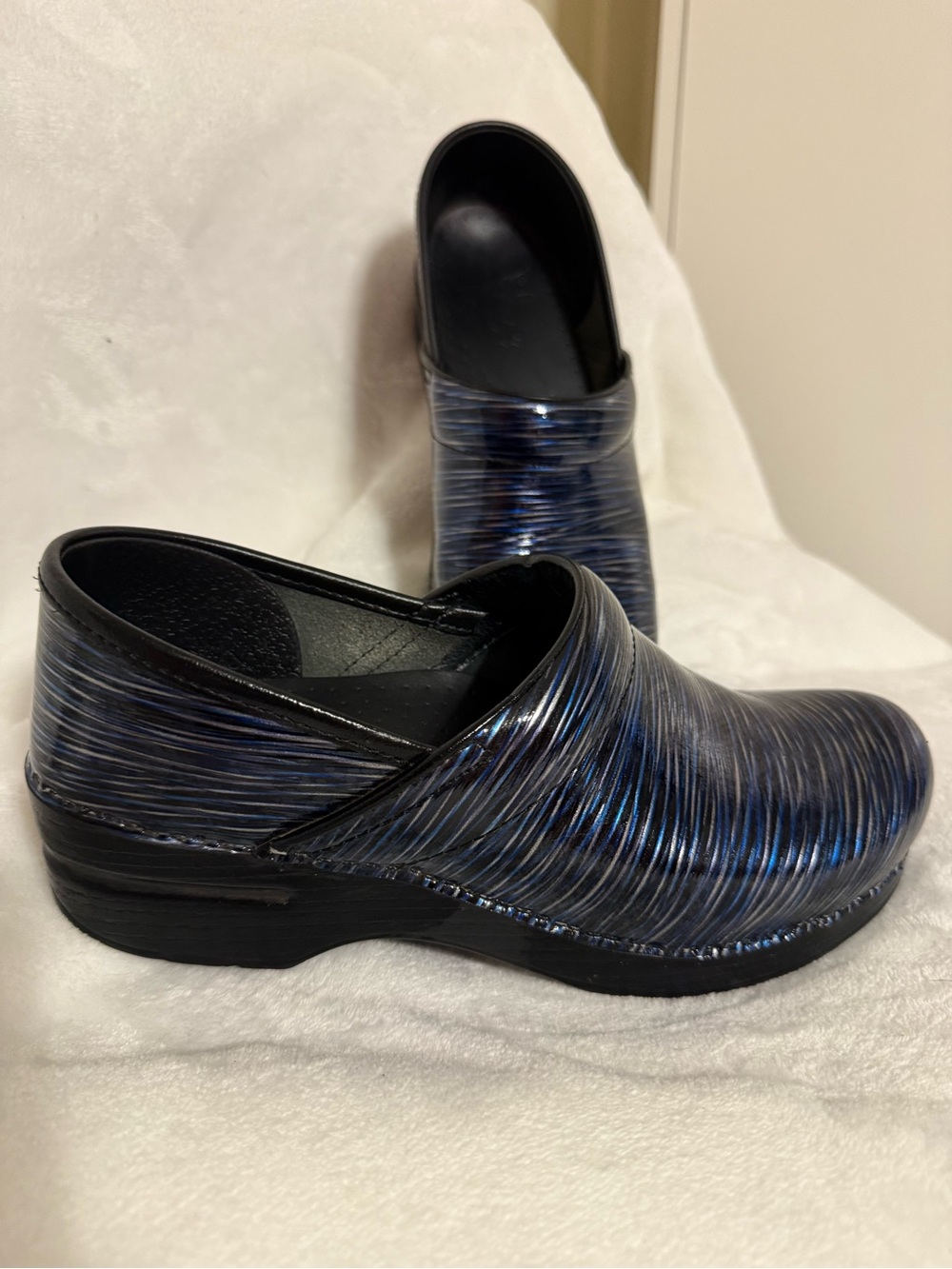 Dansko Black and Blue Shimmer Slip-On Clogs
